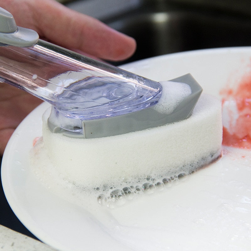 Dishwashing brush with integrated detergent dispenser