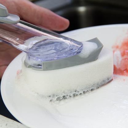 Dishwashing brush with integrated detergent dispenser